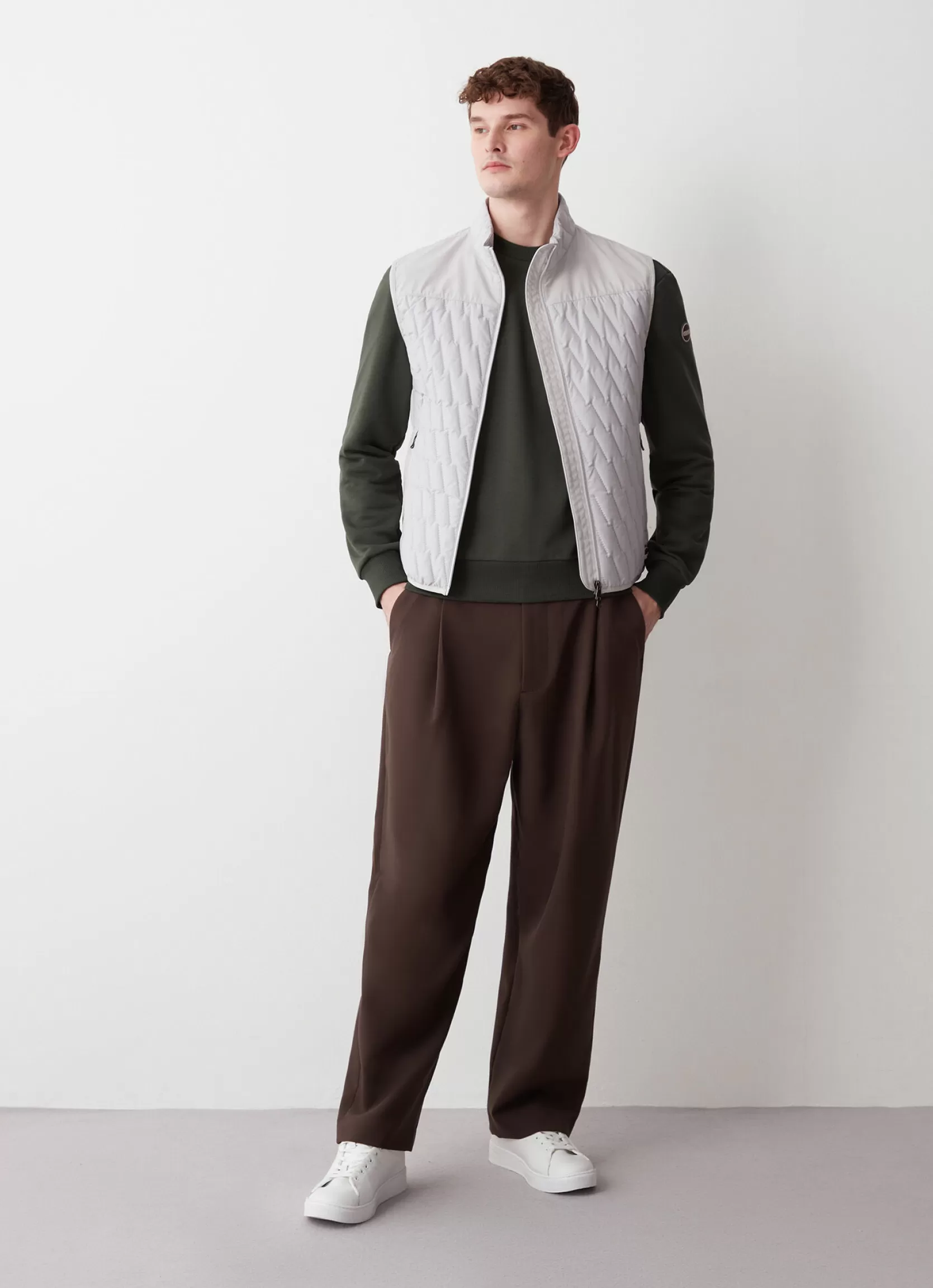 Colmar Quilted gilet with softshell inserts | man Sleeveless Jackets