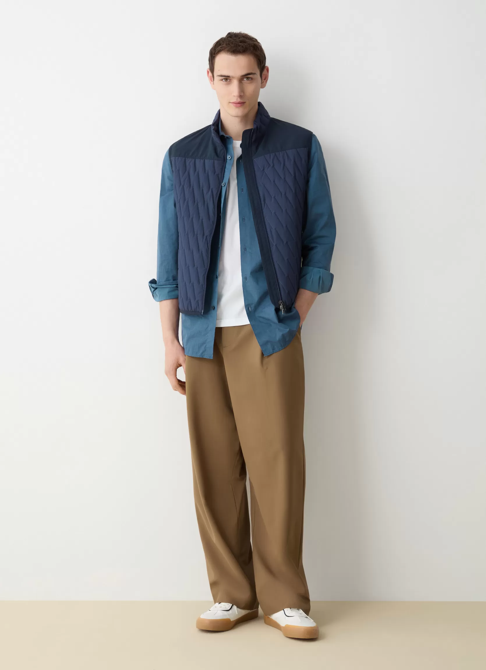 Colmar Quilted gilet with softshell inserts | man Sleeveless Jackets