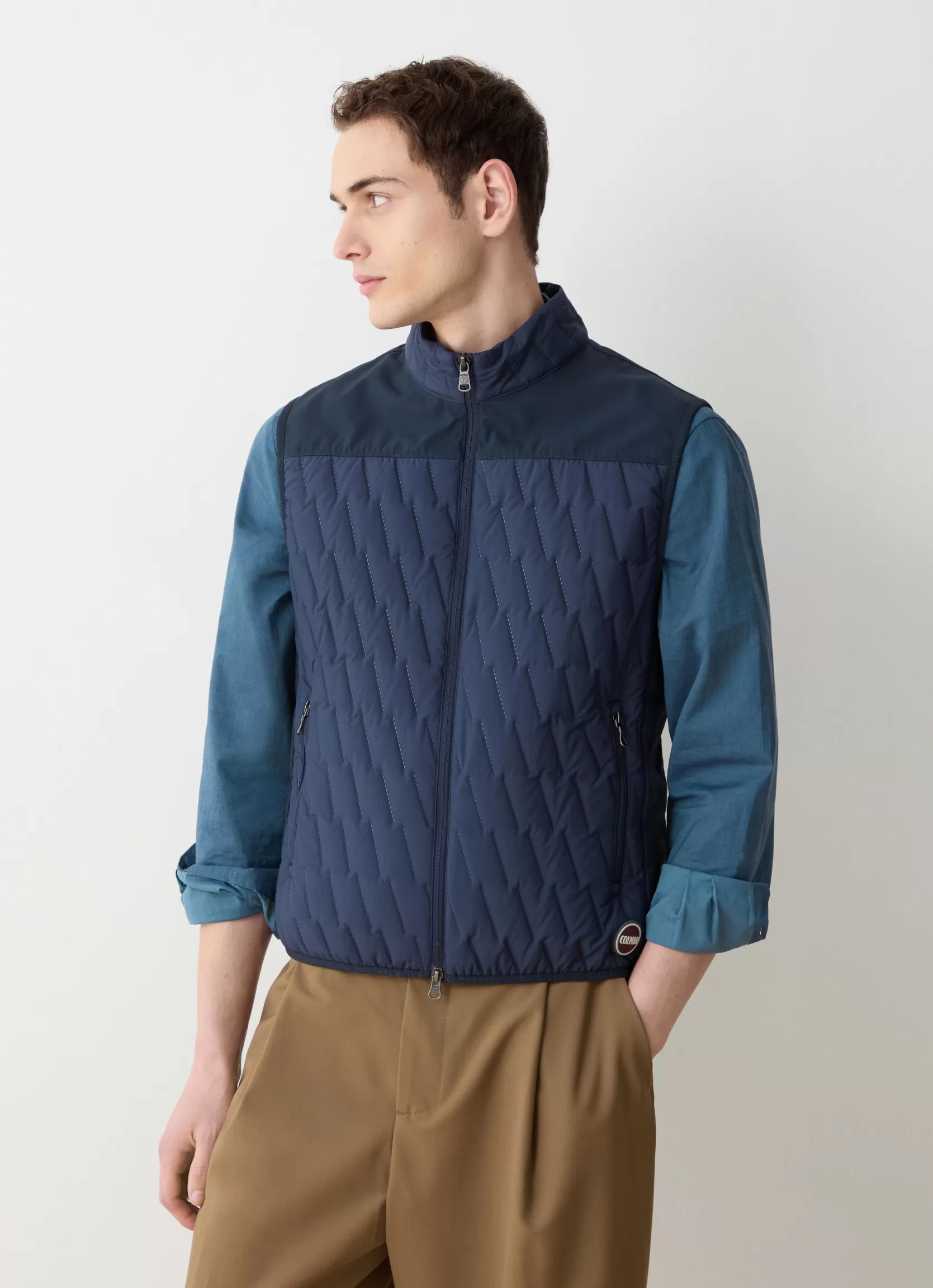 Colmar Quilted gilet with softshell inserts | man Sleeveless Jackets